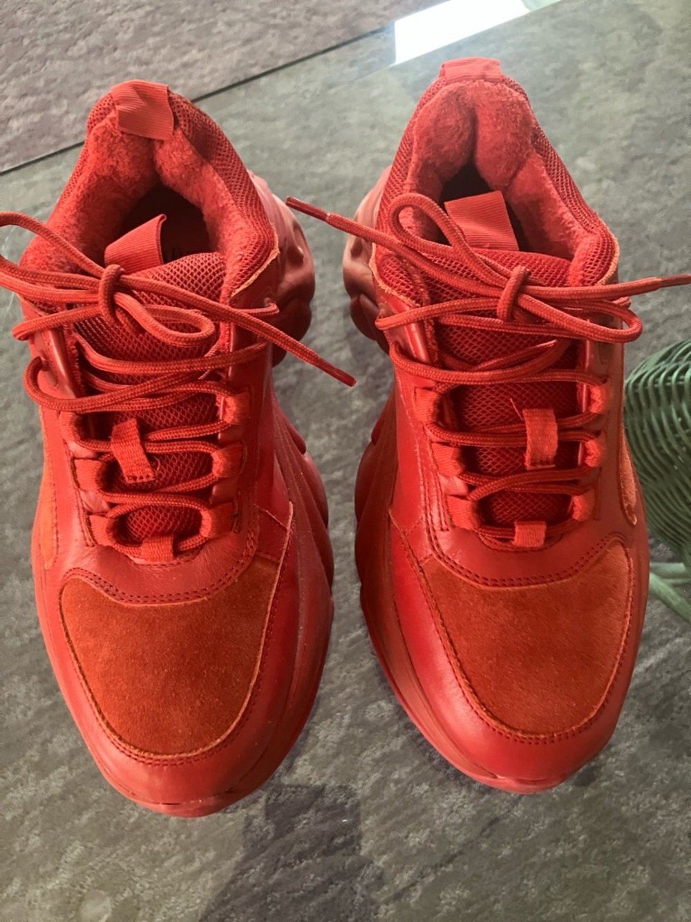 Fluevogs. Red gym shoes.